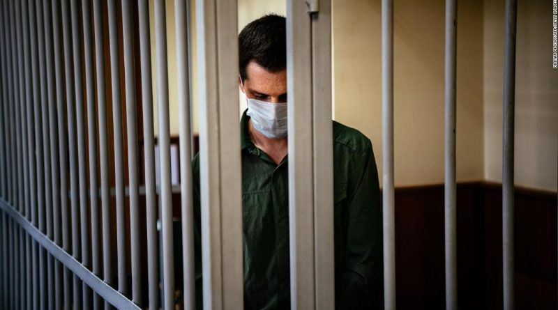American detained in Russia says he is coughing up blood, has not received medical care