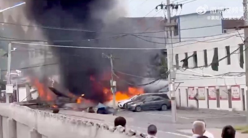 Chinese military plane crashes in residential area, at least one dead