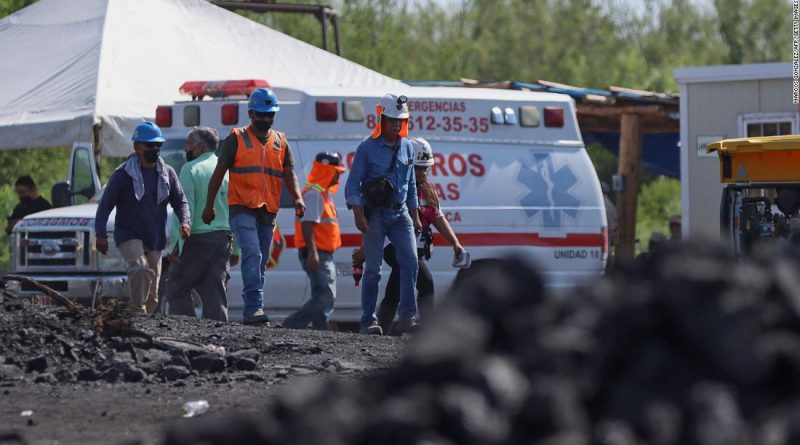 Rescuers race to free miners trapped in flooded mine in Mexico